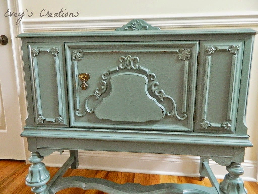 http://sweetsongbird.eveyscreations.com/2015/01/a-pretty-blue-girlvintage-buffet-redo.html