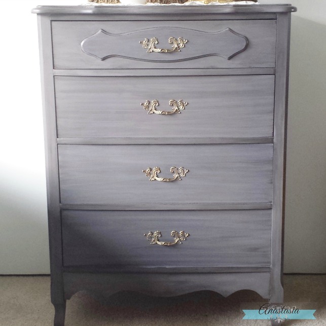 An outdated french provicial dresser brought up-to-date with General Finishes Milk Paint in Driftwood, and Pitch Black and Burnished Pearl Effects Glazes | Furniture makeover by Anastasia Vintage