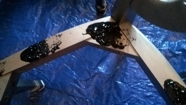 applying 2-3 “blobs” of black paint